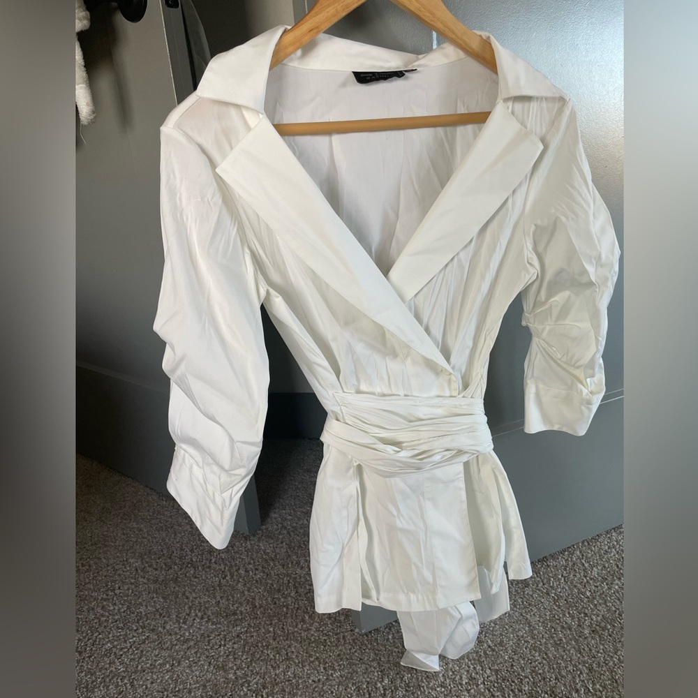 Small white new blouse, great fabric